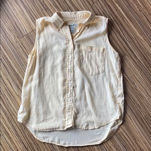 Eddie Bauer pale yellow sleeveless collared shirt.